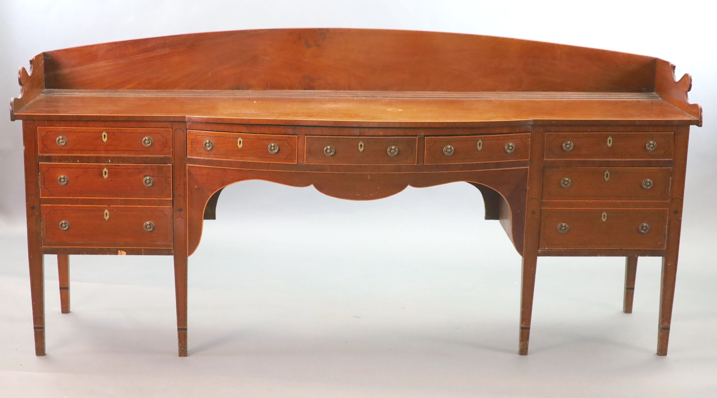 A Regency boxwood strung mahogany bowfront sideboard, W.241cm D.63cm H.118cm